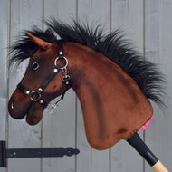 Hobby Horse Roger in left profile, brown plush with a long black mane, a black webbing halter and a light wooden stick