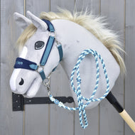 Grey Hobby Horse in the Exclusive Blue halter with embroidered navy noseband, the blue braided lead rope looped over its neck