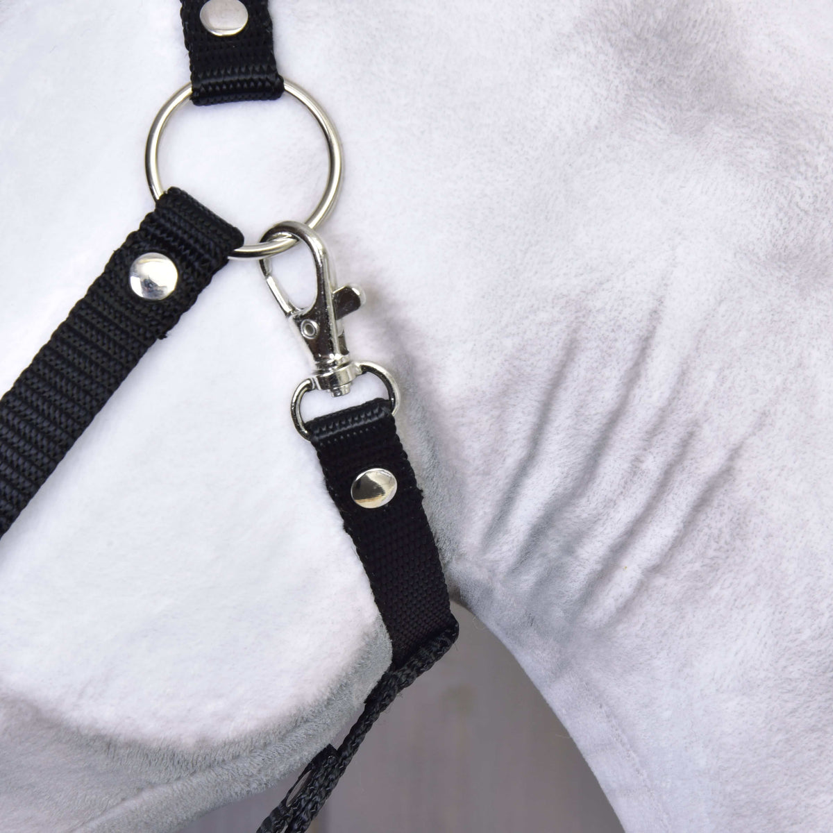 A close-up of the Hobby Horse LarDen Hobby Horse Elektra with Black Halter, highlighting its secure black halter hardware and detailed craftsmanship, reminiscent of tack used for a Lipizzaner Mare.
