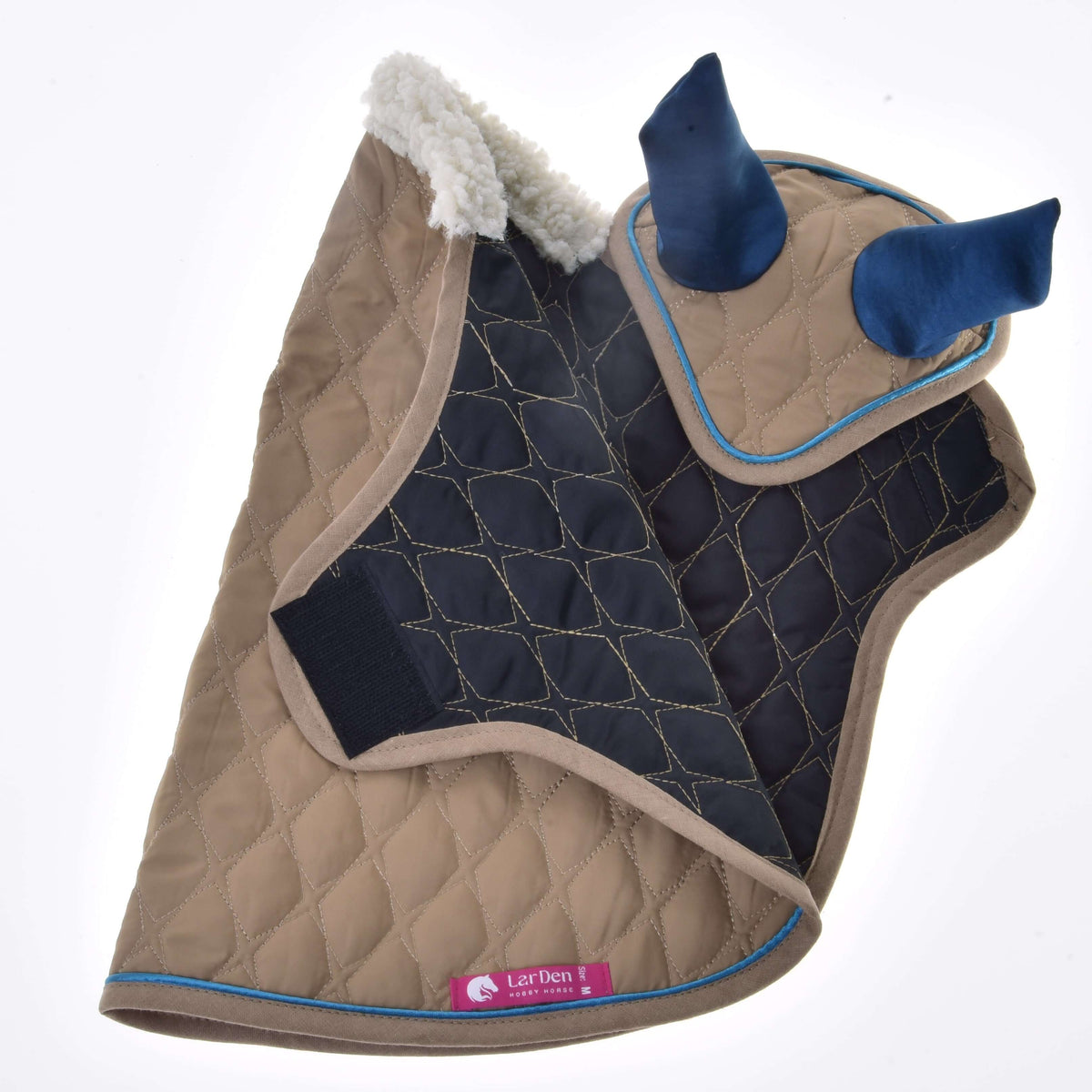 The Set Almond Star dog coat by Hobby Horse LarDen features quilted tan and navy-blue fabric, a soft fleece collar, upright blue ear-shaped accents like an ear bonnet, and a pink LarDen tag for hobby horse-inspired charm.