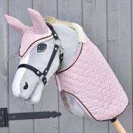 Pink quilted blanket and ear bonnet set worn by a grey Hobby Horse