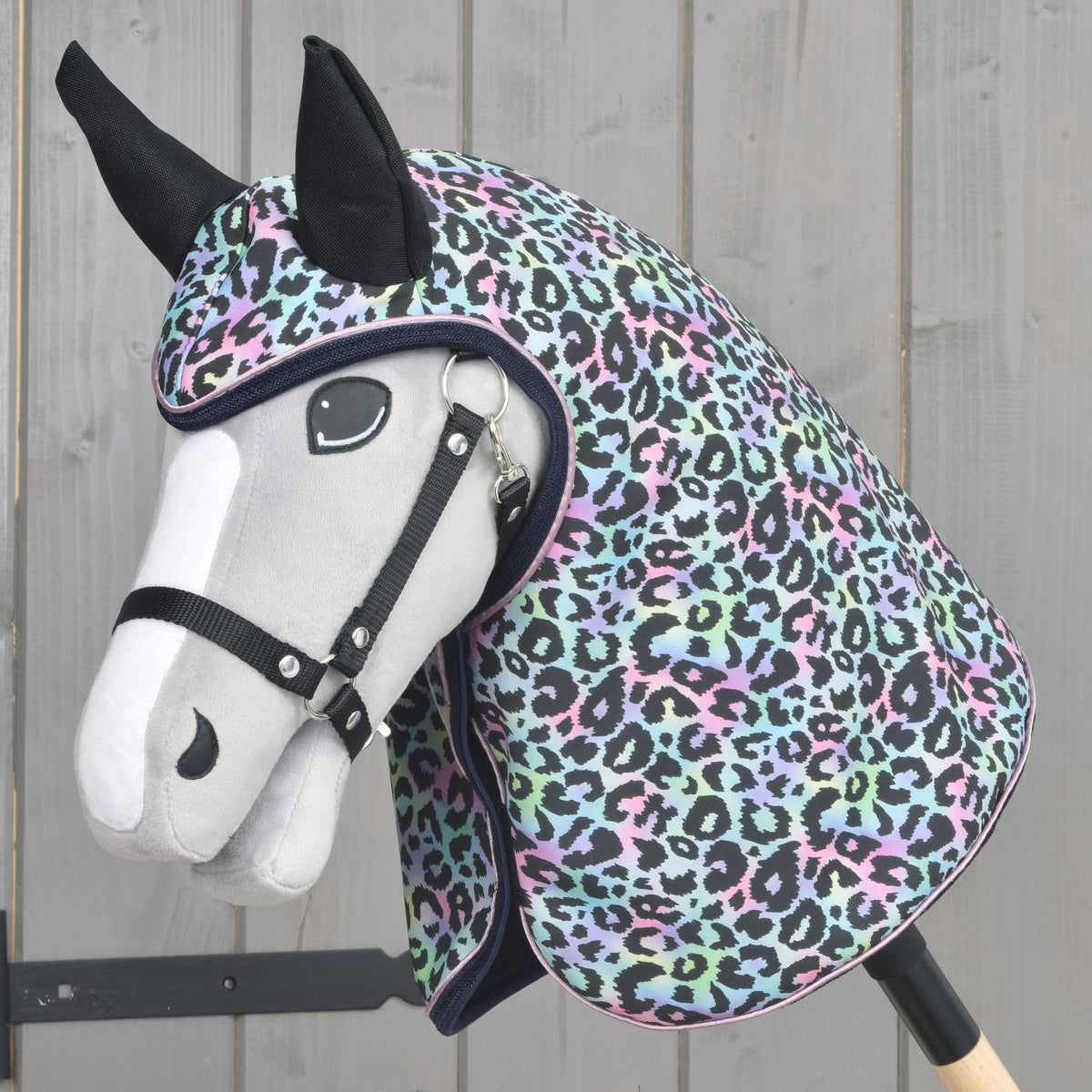 Hobby Horse Raincoat Confetti (softshell) worn by a grey Hobby Horse with black edging