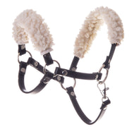 The Hobby Horse LarDen Black halter with fur – leatherette features metal rings, clips, and soft white fleece on the noseband and crownpiece—ideal as a hobby horse halter or accessory, shown isolated on a white background.