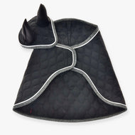 The Set Thermo Black Queen by Hobby Horse LarDen is a quilted black pet cape with silver trim and a hood featuring pointed black ears, inspired by an ear bonnet—an adorable costume for your dog or cat.