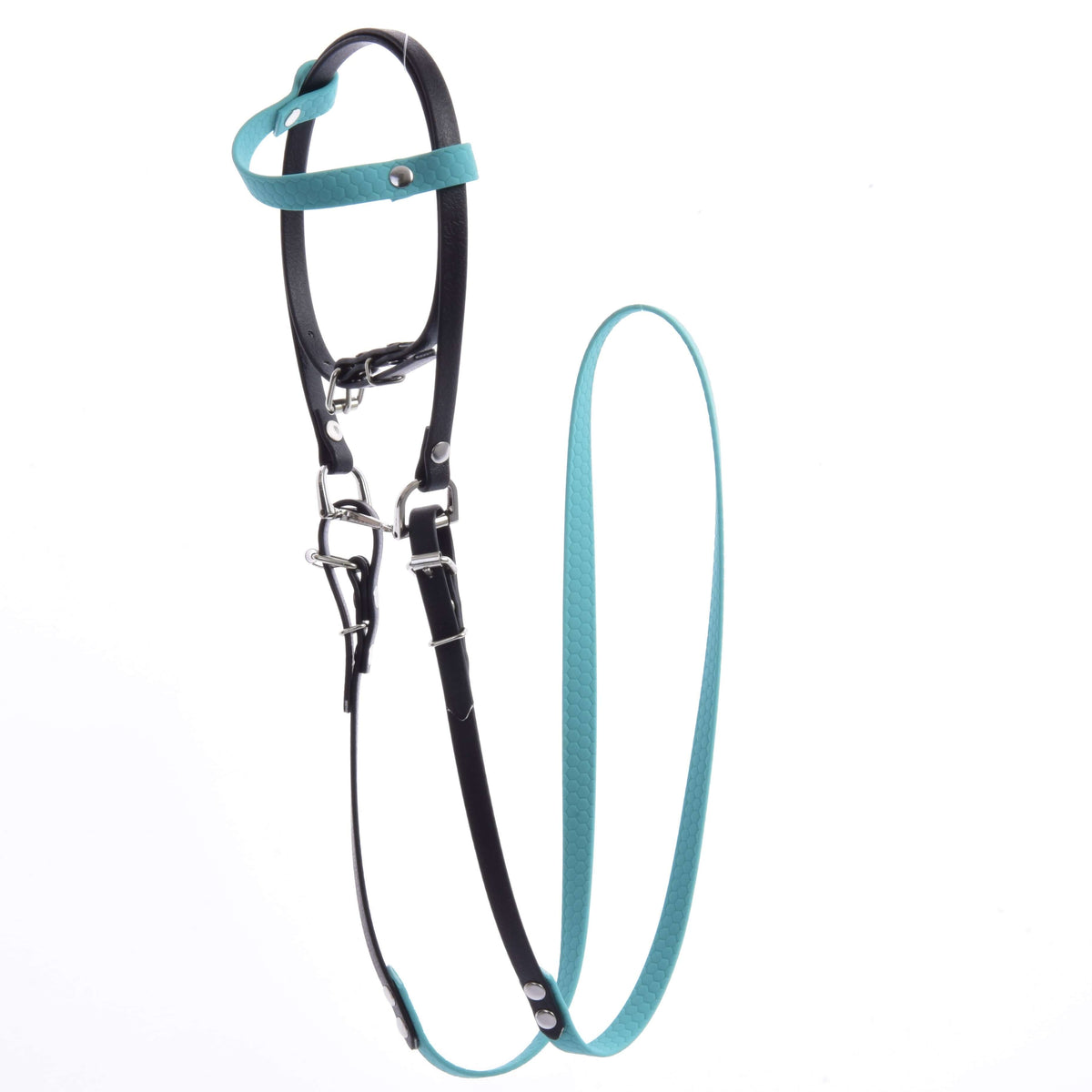 Black and turquoise leatherette Hobby Horse bridle with bit and turquoise reins, laid out on white