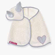 The Set Snowflake by Hobby Horse LarDen features a soft, white baby cape with a heart patch, blue trim, and a matching hood with blue horns—resembling a playful ear bonnet. The cape is laid flat with a pink label at the bottom left.
