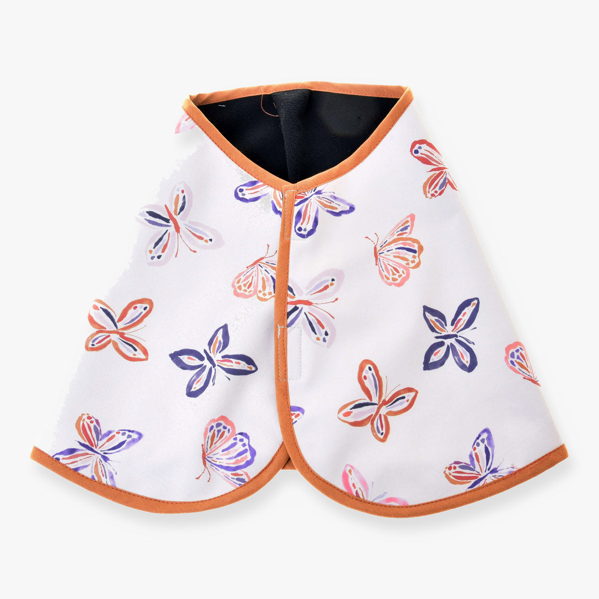 The Blanket Butterfly (softshell) by Hobby Horse LarDen is a white cape with orange trim and vibrant butterfly patterns in orange, blue, and purple—ideal as a unique blanket for horse training sessions.
