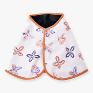 The Blanket Butterfly (softshell) by Hobby Horse LarDen is a white cape with orange trim and vibrant butterfly patterns in orange, blue, and purple—ideal as a unique blanket for horse training sessions.