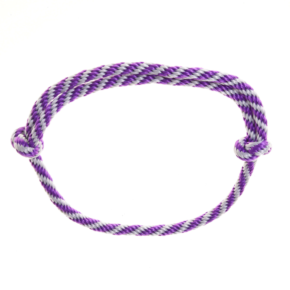 The Hobby Horse LarDen Set Start Purple includes a halter, cordeo, lead rope, and reins in twisted purple and white—ideal for Hobby Horse accessories—displayed on a plain white background.