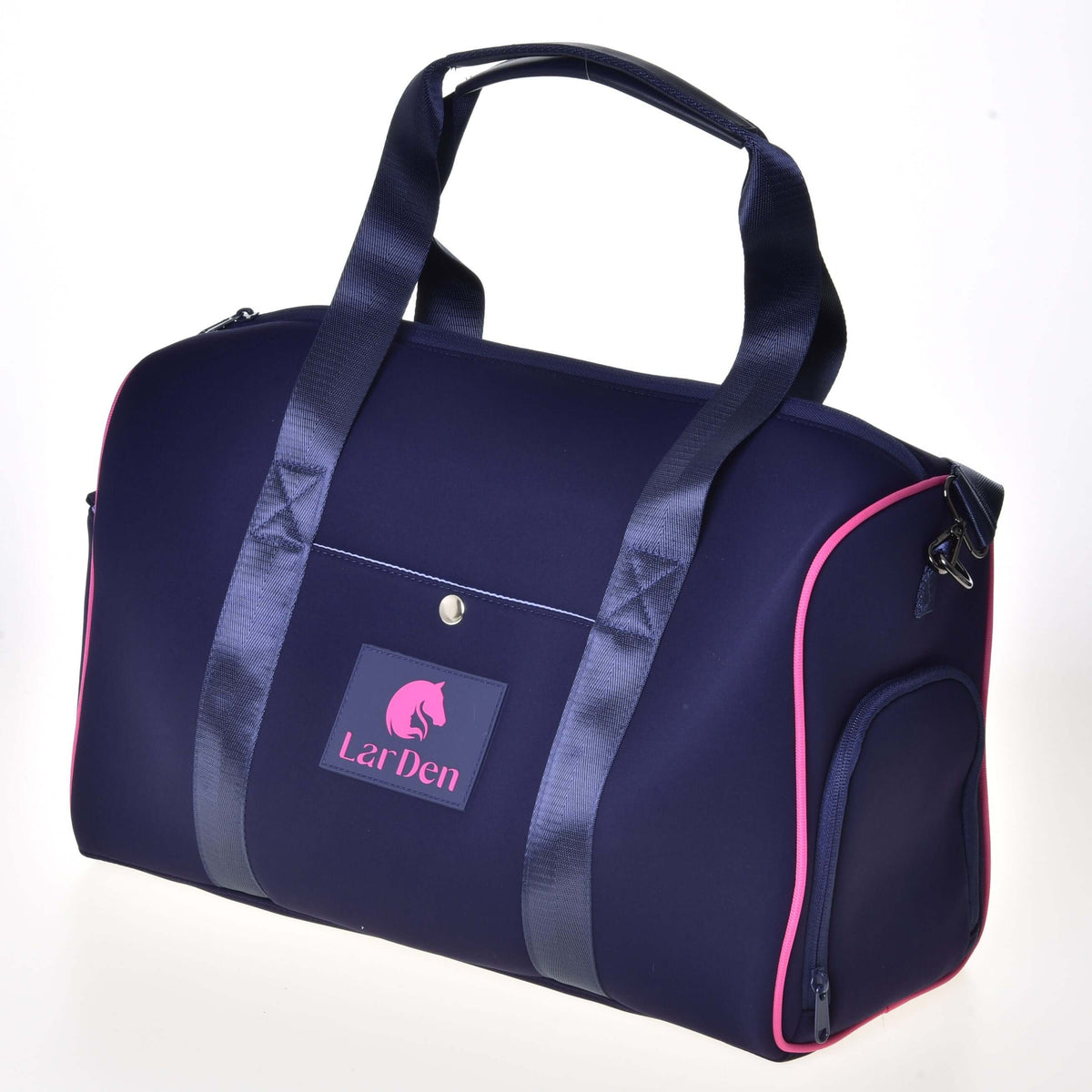Navy Hobby Horse Sports bag with pink piping standing upright, webbing handles raised and a zipped end pocket