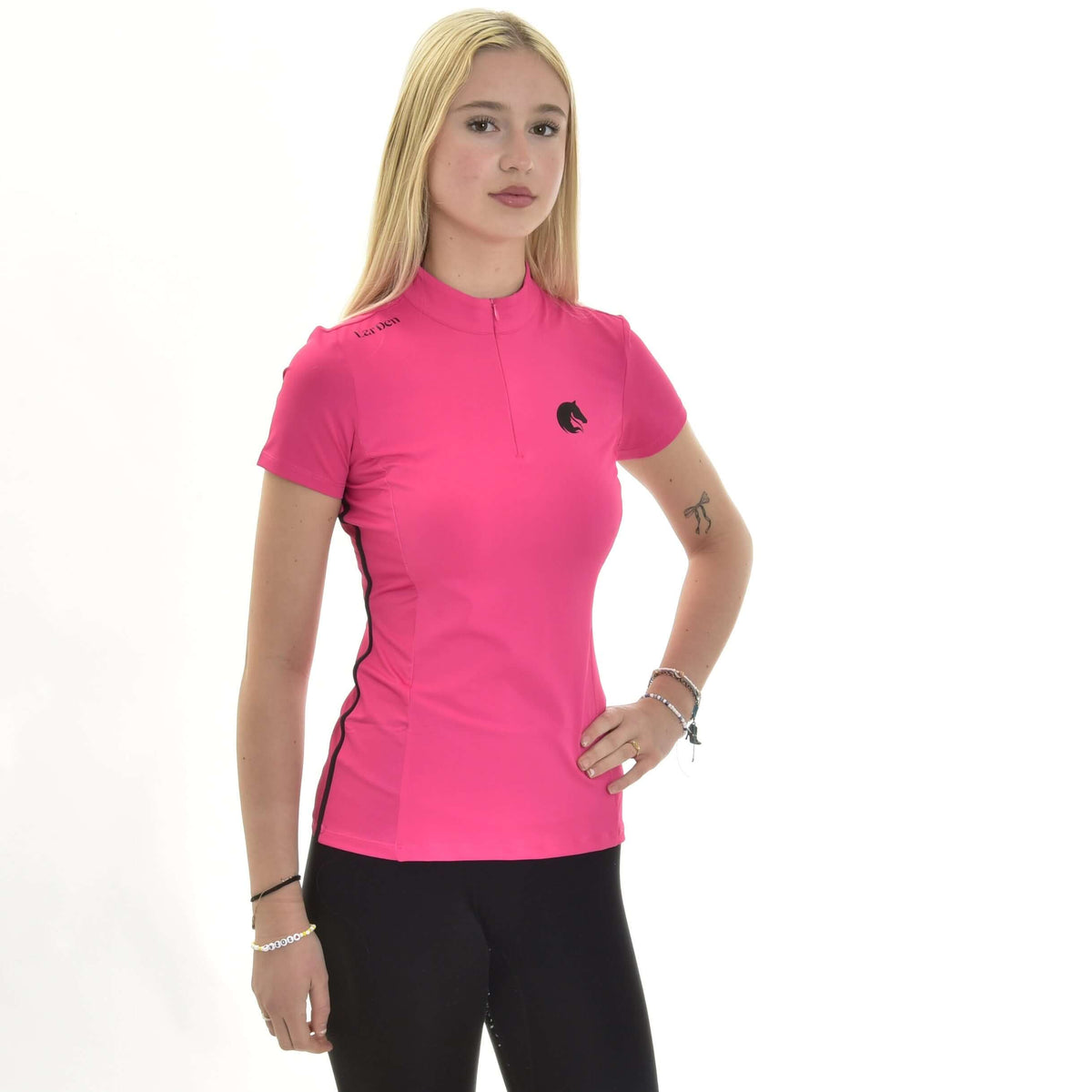 Hobby Horse T-Shirt LarDen Pink worn by a blonde girl, a fitted sports top with short zip and black horse head logo