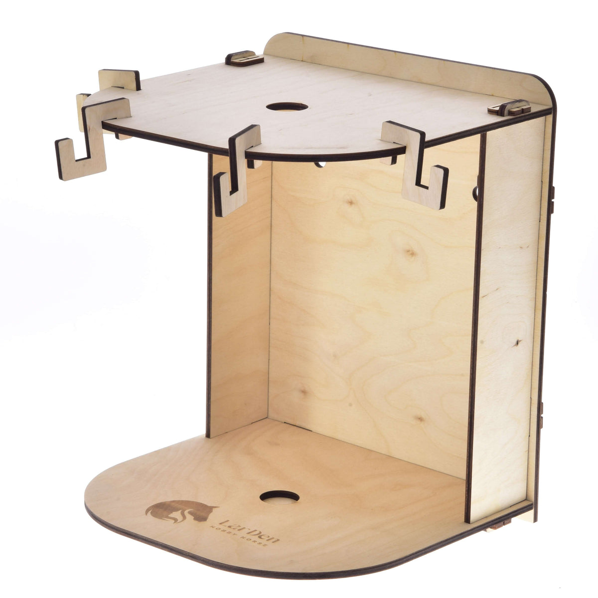 The Hobby Horse LarDen Small Hobby Horse Stable features a minimalist design with a flat base, vertical back panel, top shelf with cut-out hooks, laser-engraved logo on the base, and a central hole for cable management.
