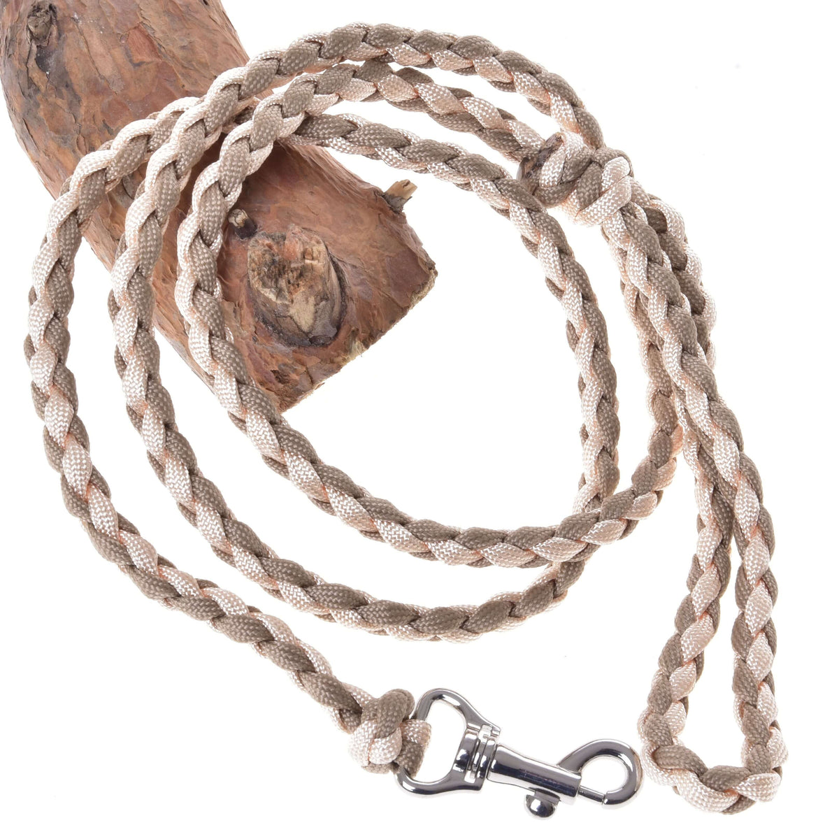 The Hobby Horse LarDen Knitted Lead Rope Double Latte, a braided beige and light brown paracord rope with a metal clasp, is looped around wood and displayed on a white background.