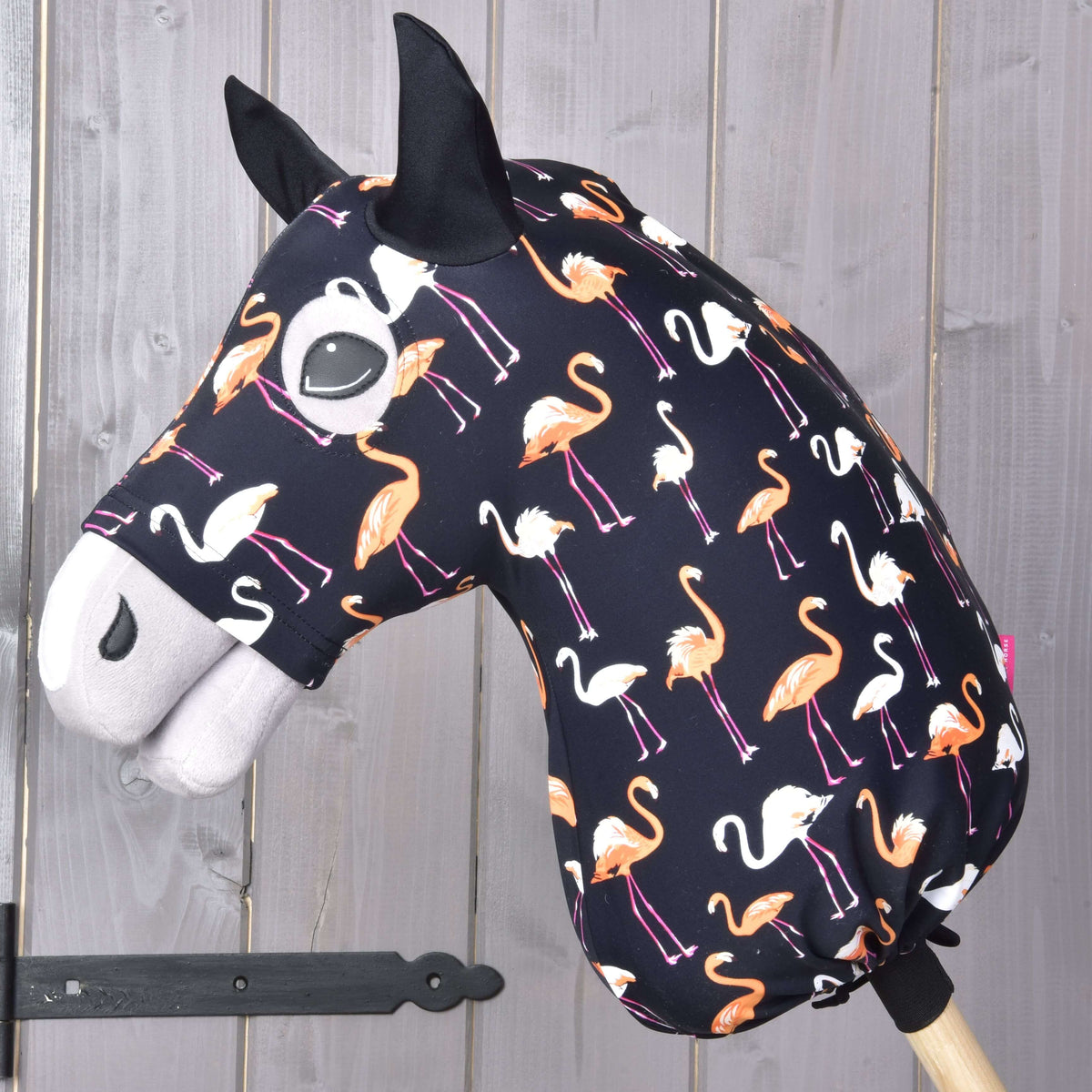 Hobby Horse Protective suit Lycra Flamingo by LarDen on a grey head, black with orange and white flamingos and black ears