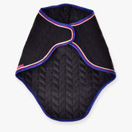 The Hobby Horse LarDen Travel Rug Luxury is a black quilted pet coat with blue edges and red, white, and blue trim, featuring a curved overlapping front—styled like an elegant horse rug for that signature Hobby Horse Travel Rug look.