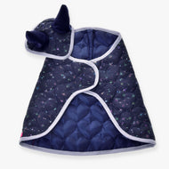 The Set Magic by Hobby Horse LarDen features a dark blue quilted cape with light trim and star patterns, plus a matching hood with two unicorn-like horns—perfect as a whimsical Hobby Horse blanket or playful horse insect protection.