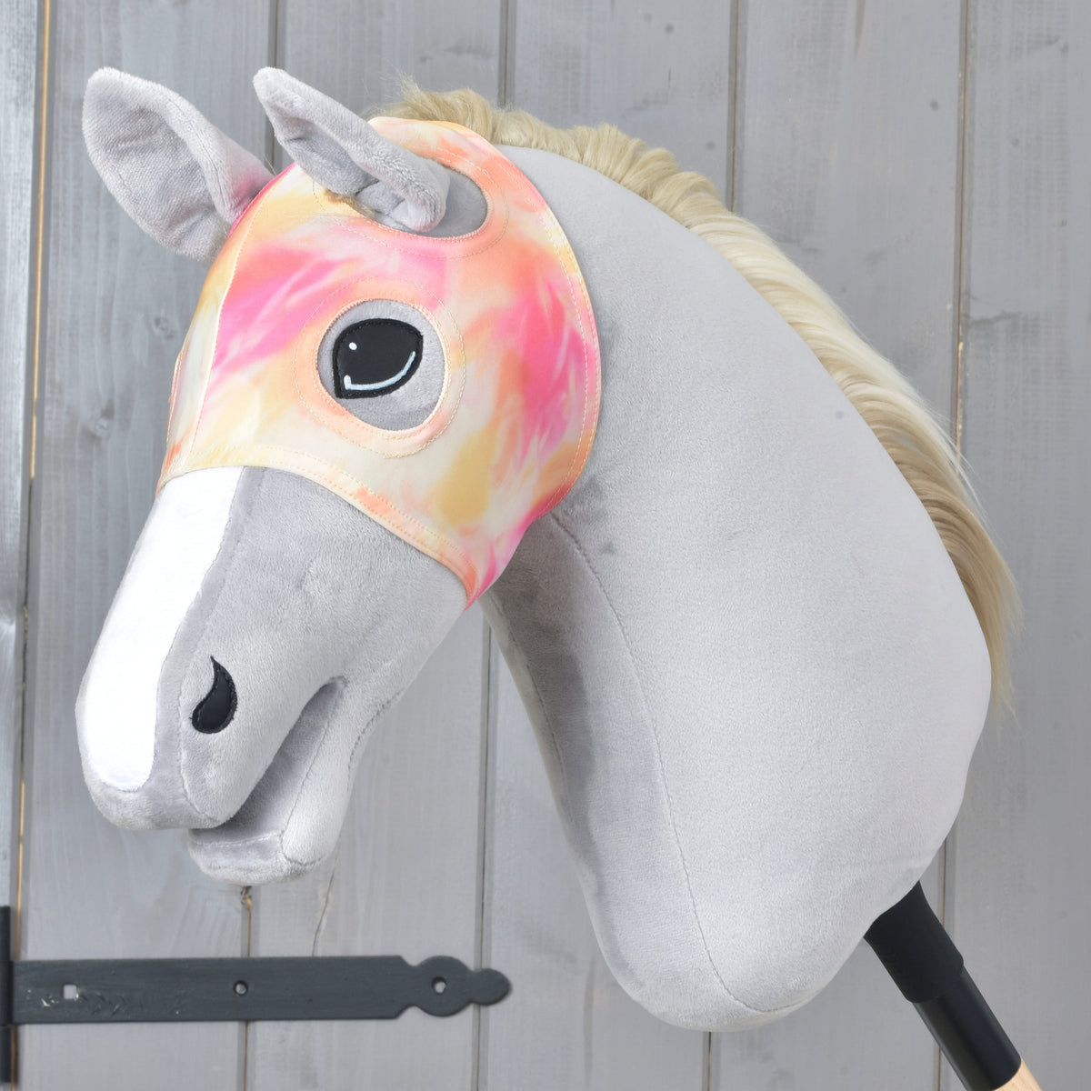 Horse Mask without ears Mirage by LarDen on a light grey Hobby Horse, pink, peach and yellow tie-dye with ear openings