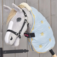 Pale blue stable blanket with yellow flower embroidery worn by a grey Hobby Horse