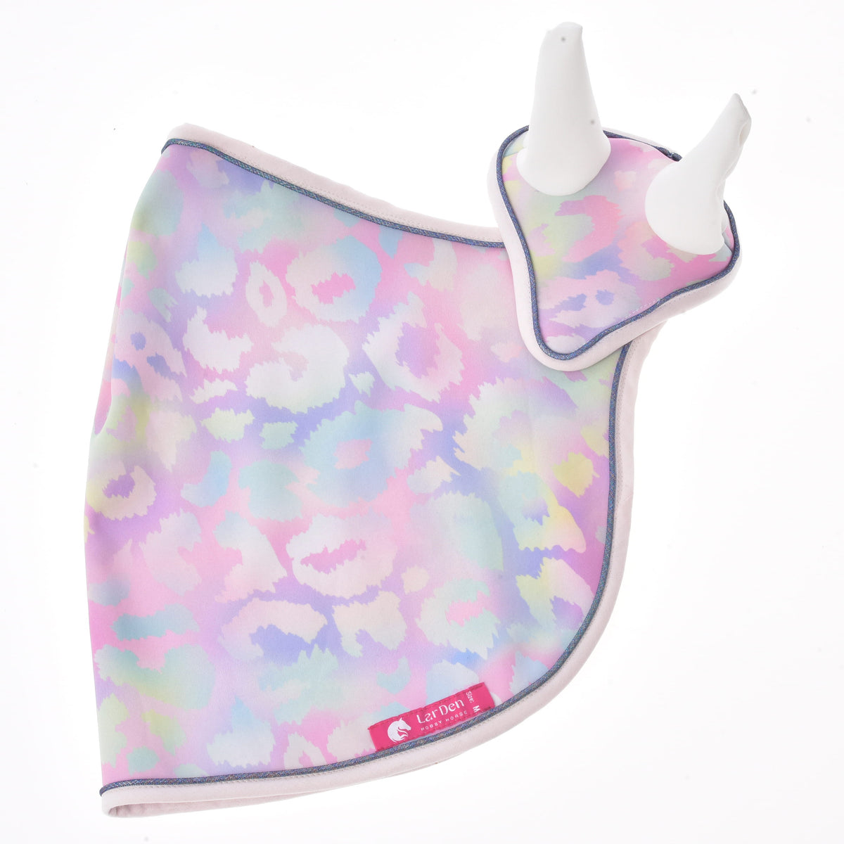 Pastel patterned Hobby Horse blanket and ear bonnet set shown from the side