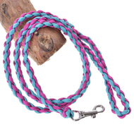 The Hobby Horse LarDen "Knitted Lead Rope Pinkie-Blue" is a hand-knitted pink and blue dog leash with a sturdy metal clasp, shown looped around a piece of wood.
