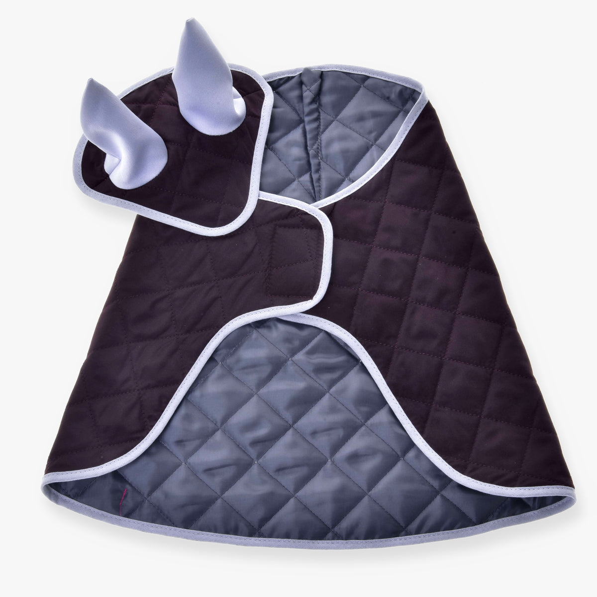 The Set Purple by Hobby Horse LarDen is a quilted gray and black cape with white trim, two upright ears, and animal-inspired details—great as a unique blanket or playful ear bonnet for your hobby horse.