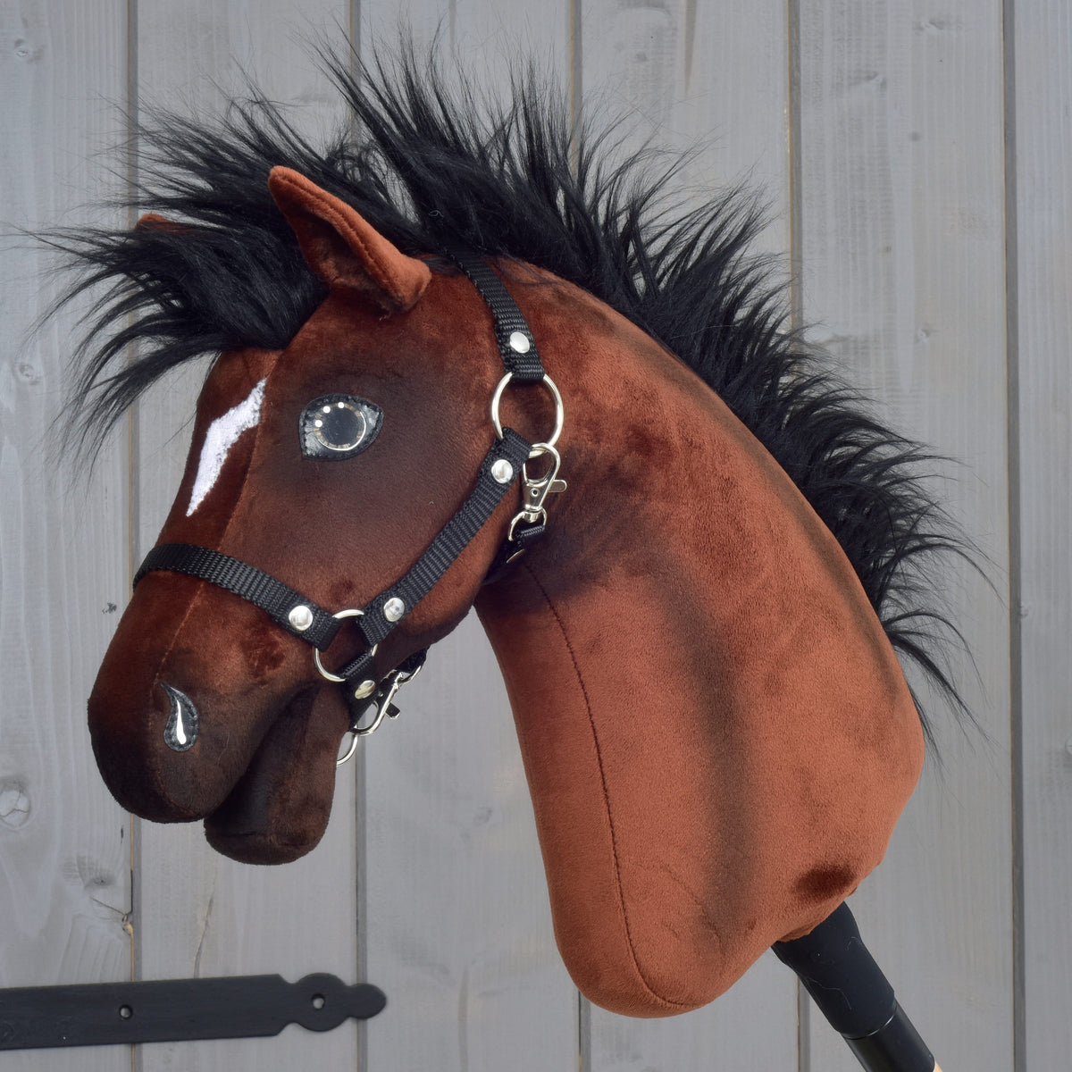 Hobby Horse Roger by LarDen, a brown plush head with a shaggy black faux fur mane, a small white blaze and a black halter