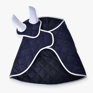 The Set Monte dog coat from Hobby Horse LarDen is a navy blue quilted coat with white trim, two leg openings, and a chest flap—perfectly styled to match your favorite horse decoration or Hobby Horse blanket.