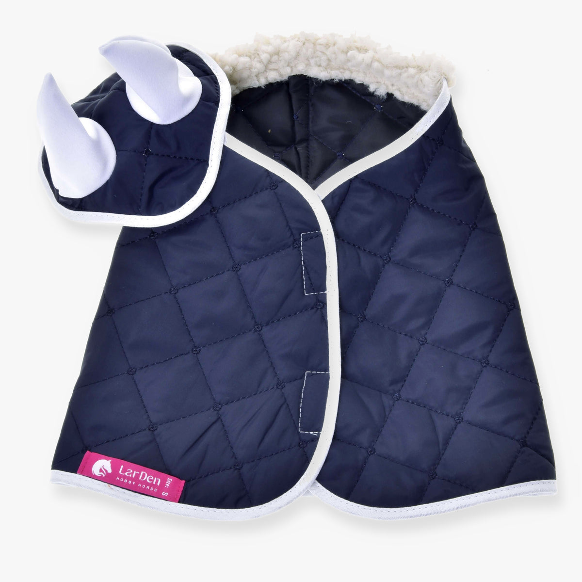 The Set Thermo Blue by Hobby Horse LarDen is a navy blue quilted pet coat with white trim, a hood with two stuffed white horns for a rhinoceros look, and soft fuzzy lining, inspired by classic Hobby Horse blanket designs.