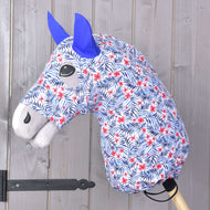 The Hobby Horse LarDen Hobby Horse protective suit Avatar (Lycra) features a fabric head with a blue and red floral pattern, blue felt ears, gray mane, and includes a washable cover. It is mounted on a wooden stick against a wooden panel backdrop.