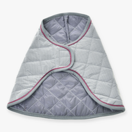 The Blanket Silver Eleganza by Hobby Horse LarDen is a quilted gray pet vest with pink piping, a wrap-around design, and soft padding, displayed flat on a white background.