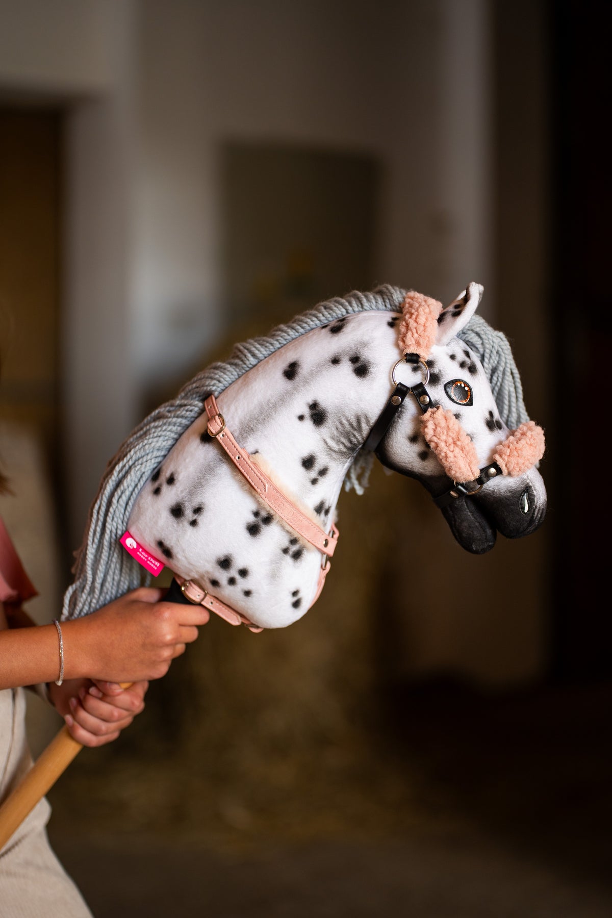 Hobby Horse Breastgirth with fur Mullbery in pink leatherette worn on a spotted Hobby Horse