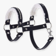 The Halter with fur - leatherette Espresso by Hobby Horse LarDen is a black leatherette pet harness with silver studs, metal rings, soft white faux fur lining, and rhinestones, inspired by hobby horse halter designs for comfort and security.