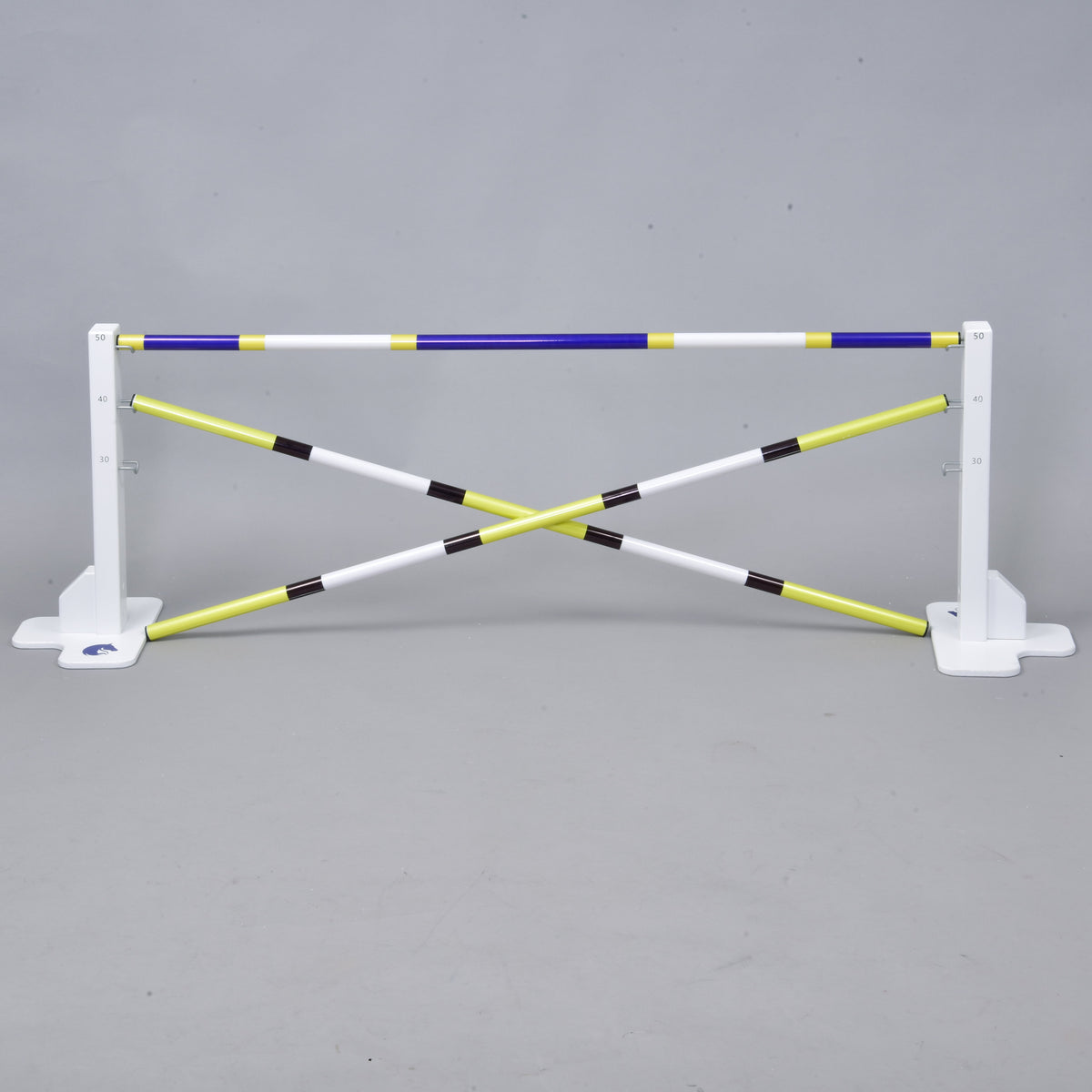 The Hobby Horse LarDen Jump 50 cm / 20 inch with Extra Poles is a white and yellow adjustable hurdle with crossed bars and measurement markings—ideal for hobby horsing and fun indoor or outdoor activities.