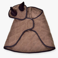 The Set Manchester Le Chocolate by Hobby Horse LarDen is a quilted, light brown pet coat with dark brown trim and two upright, dark brown ears on the hood, resembling a playful animal blanket. It is shown laid flat on a white background.