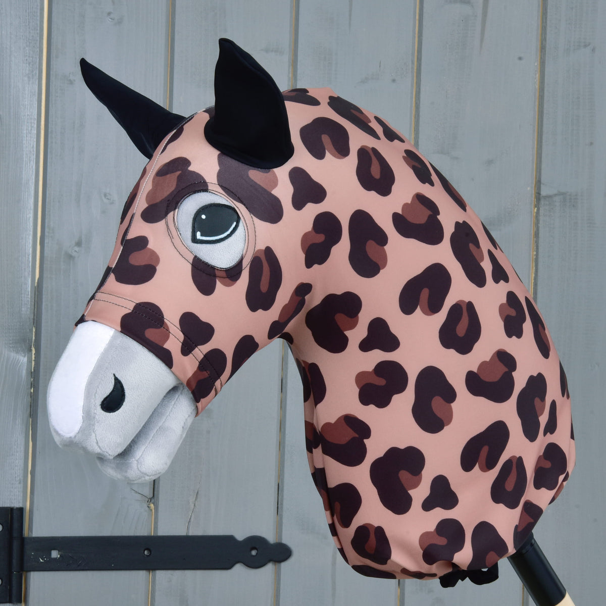 Hobby Horse protective suit Glamour by LarDen in blush pink leopard print with black ears, covering the whole head and neck