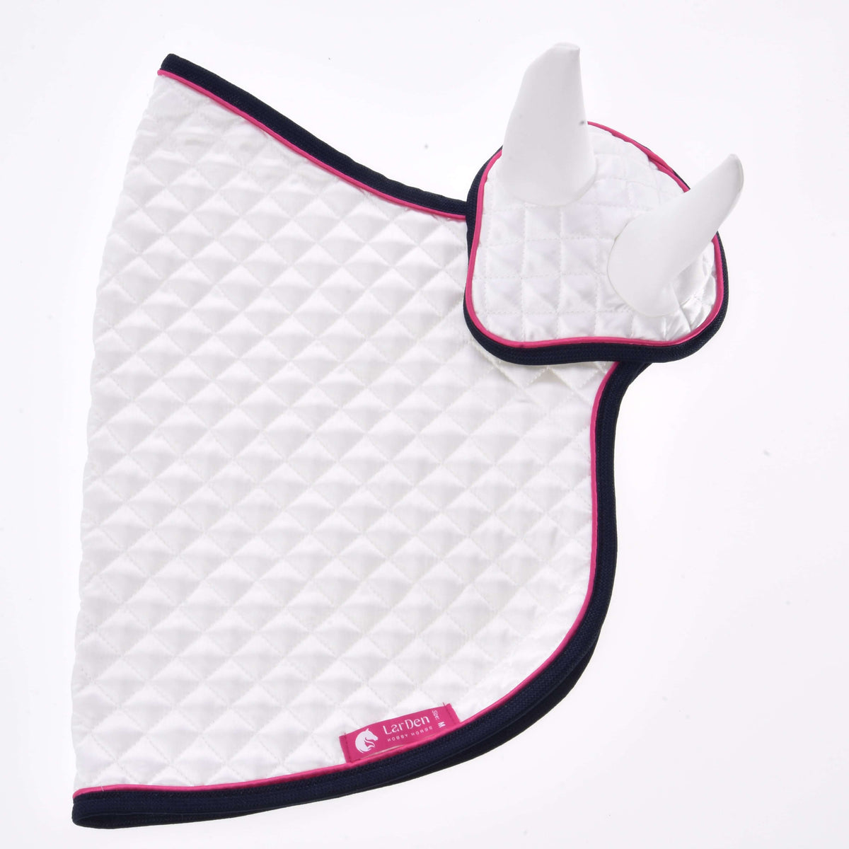 The Set Beautiful Star by Hobby Horse LarDen is a white quilted horse ear bonnet with two pointed ear covers, trimmed in navy blue and pink, featuring a pink Cathery tag at the bottom and laid flat on a white background.