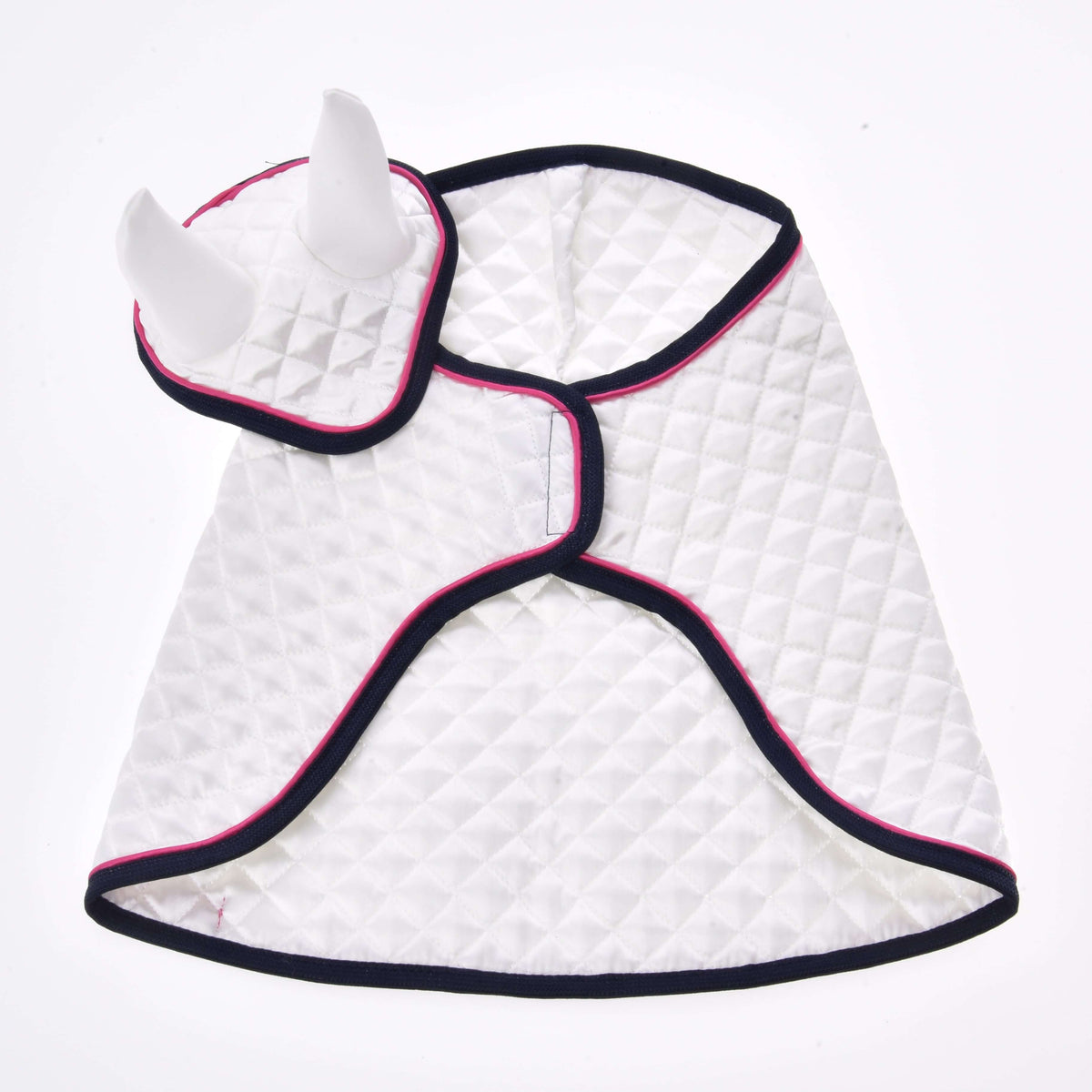 The Set Beautiful Star by Hobby Horse LarDen is a quilted white cape with navy and pink trim, featuring two upright horn-like shapes—ideal as a playful blanket or ear bonnet set for kids’ fantasy costumes or pet dress-up.