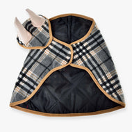 The Set England Grey dog coat by Hobby Horse LarDen features a fleece lining, tan trim, and black quilted interior—displayed flat with two mannequin dog legs—bringing classic equestrian charm to your pet’s wardrobe.