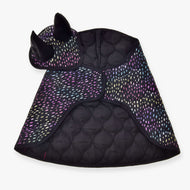 The Set Dreamy by Hobby Horse LarDen includes a black quilted cape with multicolored dots and a matching ear bonnet with two pointed black horns, both displayed flat on a white background.