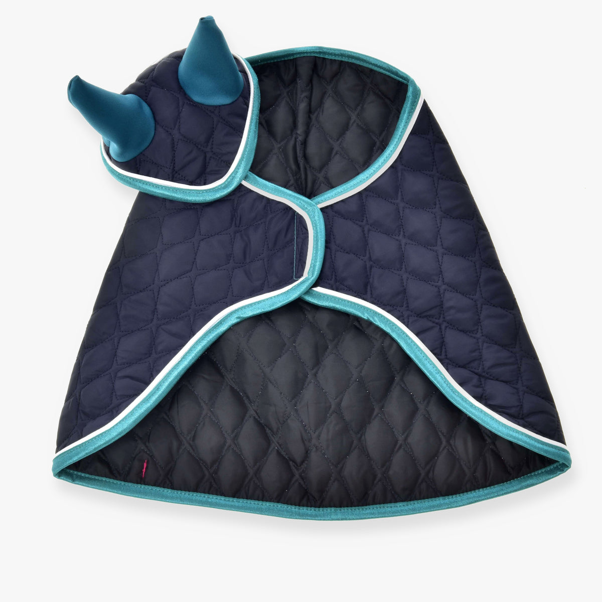 The Hobby Horse LarDen Set Supreme Turquoise is a quilted navy cape with teal trim and a hood featuring two fabric horns, ideal as a playful hobby horse blanket or for use in an imaginative ear bonnet set.