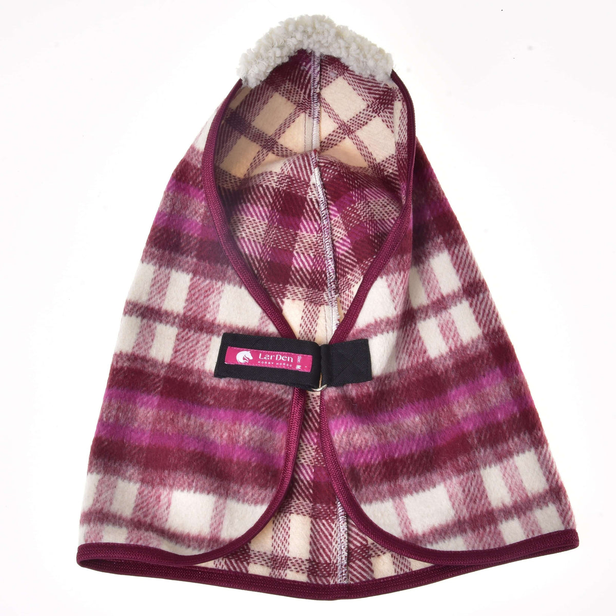 The Stable Blanket LarDen by Hobby Horse LarDen is a pink, purple, and white plaid fleece dog coat inspired by a PES horse blanket, with a soft neck lining and a velcro strap featuring a “Let’s Pet!” label.
