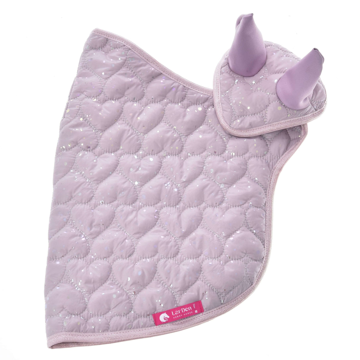 The Set Sweetest Heart by Hobby Horse LarDen is a light purple, heart-quilted ear bonnet with sparkly details, two upright ear covers, and a pink Laz Dress tag—ideal for pairing with your favorite Hobby Horse blanket.