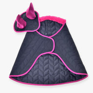 The Set Thermo Black with Fur by Hobby Horse LarDen is a cozy, whimsical black quilted coat trimmed with soft fur and two unicorn horns on the hood, offering blanket-like warmth for small pets.