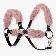 The Hobby Horse LarDen Black Halter with Old Rose Fur Complete (leatherette) features soft, fluffy pink fleece on the noseband, crown, and cheeks for added comfort and support.