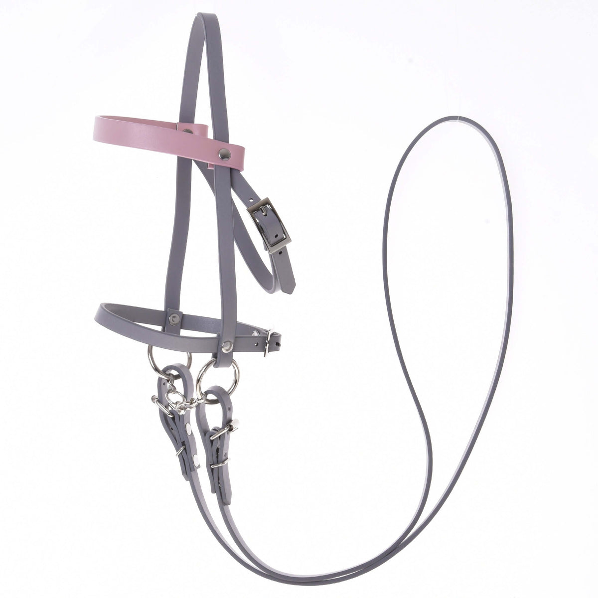 The Grey leatherette set by Hobby Horse LarDen includes a bridle, reins, and martingale in grey and light pink faux leather with metal buckles and rings, shown against a white background.
