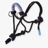 The Rope halter Summer by Hobby Horse LarDen is a black horse accessory with blue and red weaving on the noseband, blue details on the chin and tie ends, and features metal rings for attachment.